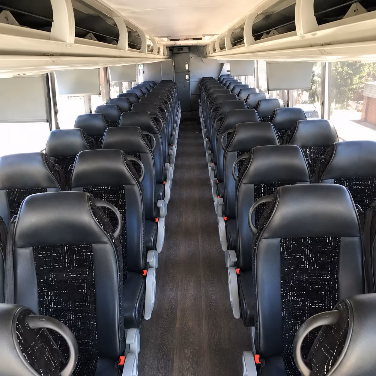 call for a charter bus to michigan international speedway michigan stadium or spartan stadium