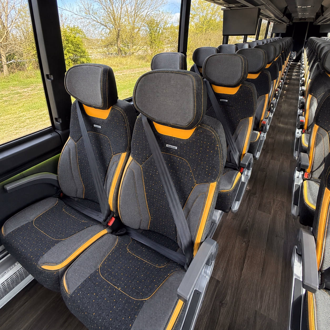how seasonality and peak times affect charter bus rates in sterling heights michigan